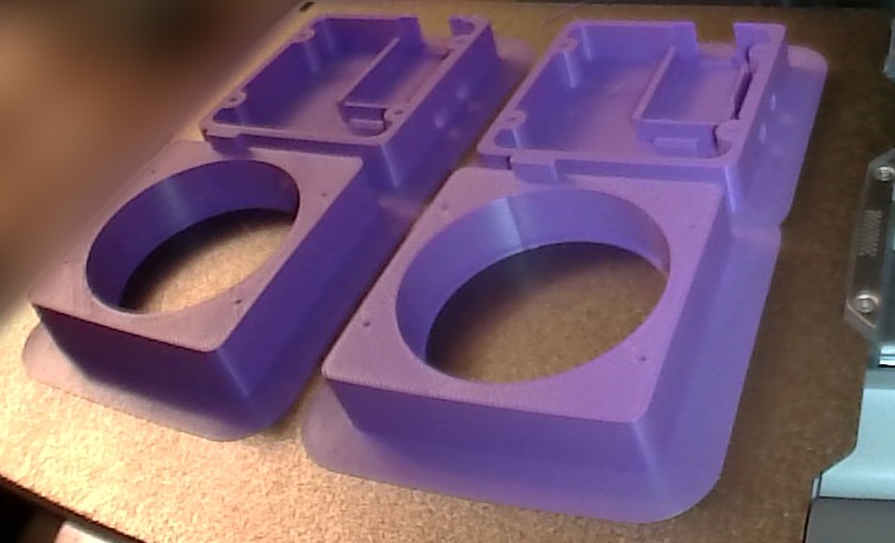 Two printed enclosures on the printer bed